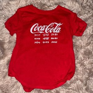 This is a Coca Cola shirt released in 2019 from the Coca Cola company